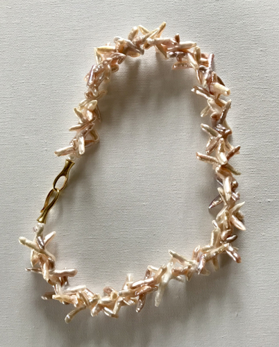 Kreuzperlenkette